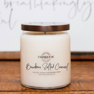Farmhouse Candle Company 'Bourbon Salted Caramel' scented soy, coconut and beeswax candle in a clear glass jar with a bronze lid.